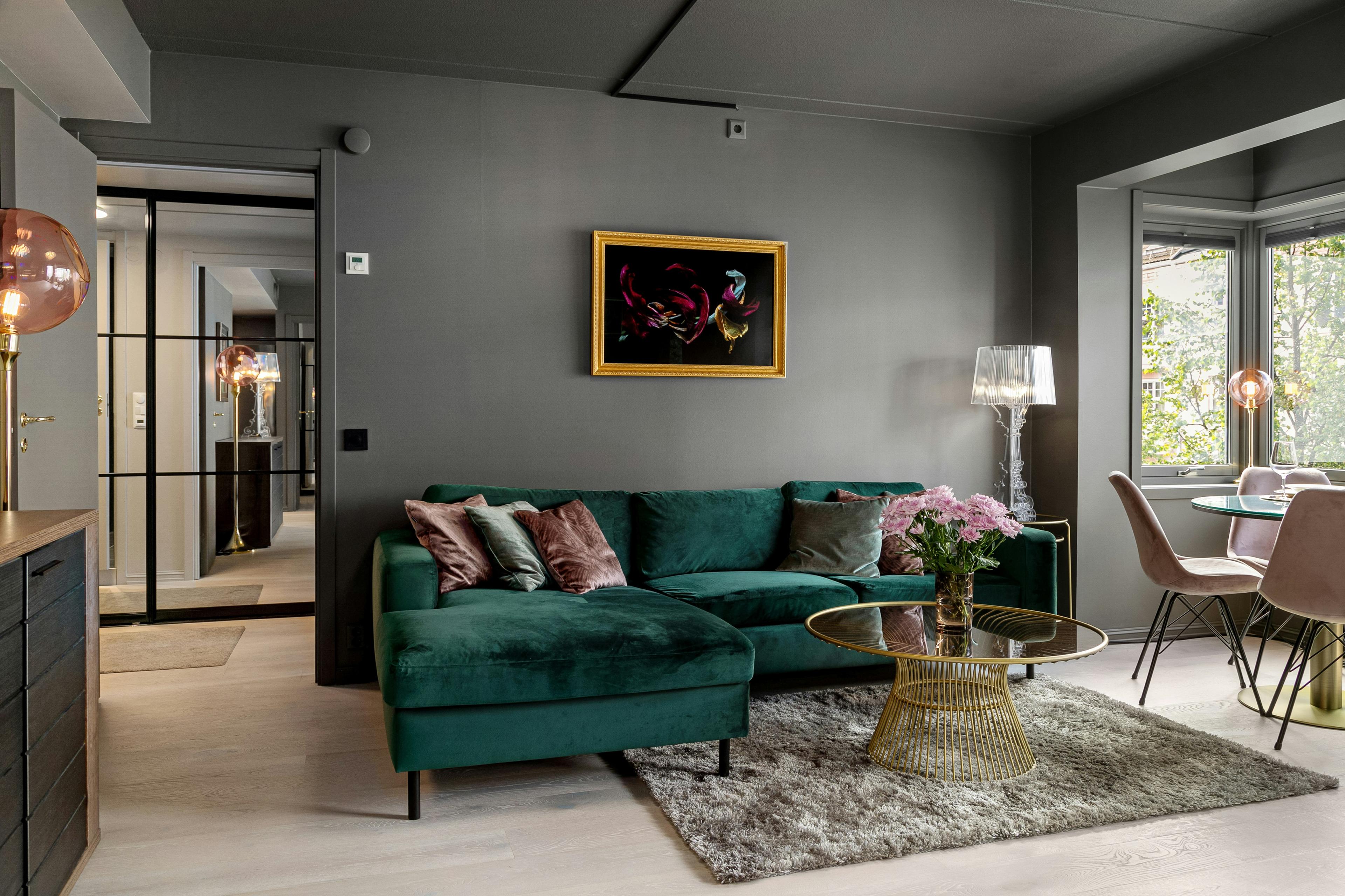 Moody modern glamour living room with sophisticated styling